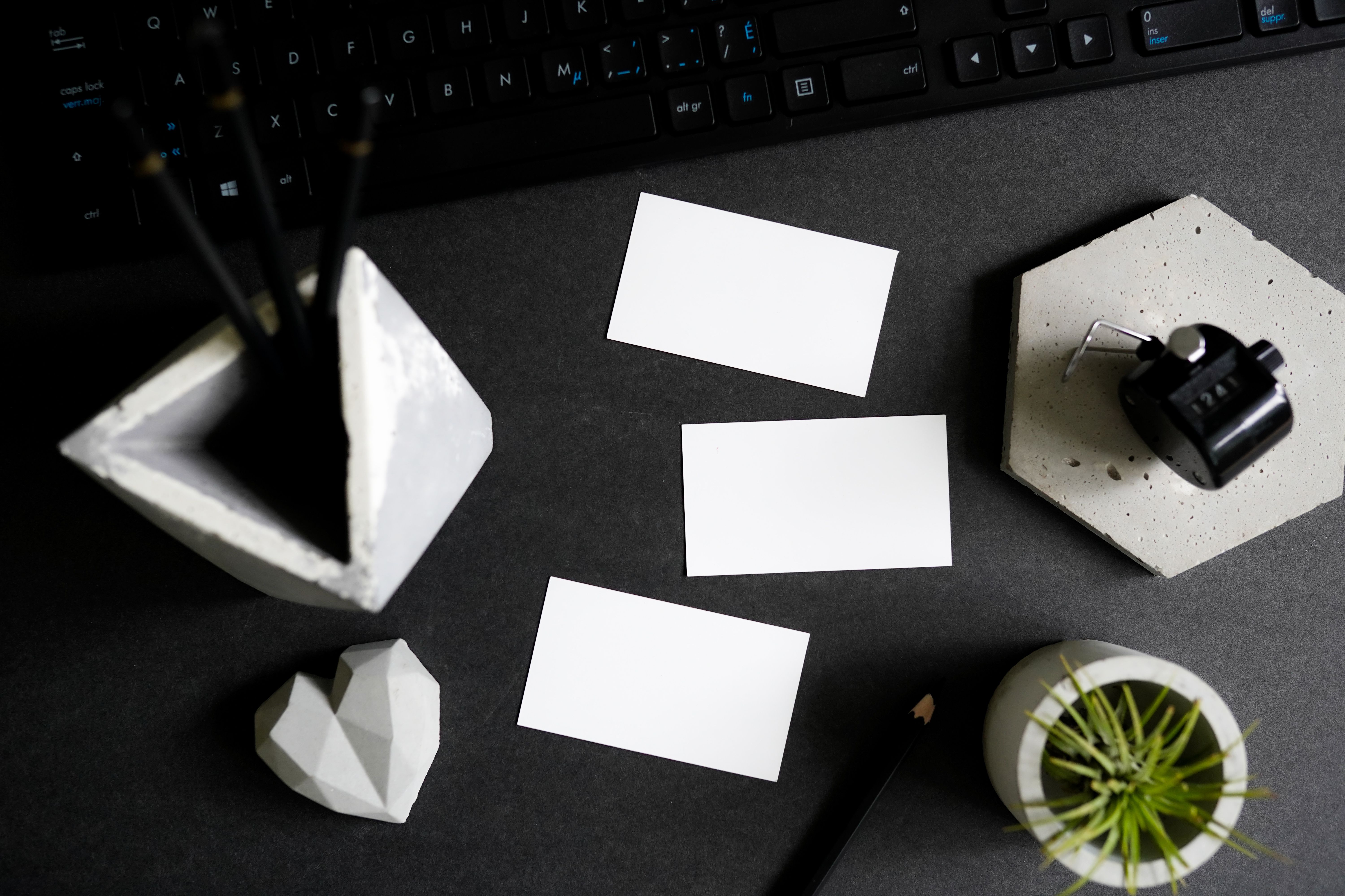 Business cards and stationery arranged on a professional desk